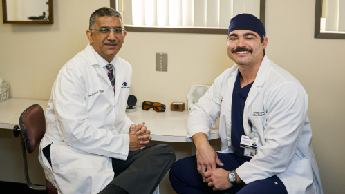 Rutgers alumnus Ravi Goel, left, with Class of 2026 graduating medical student Justin Benton, at Goel's ophthalmology office in Cherry Hill, New Jersey. Photo by Jonathan Kolbe.