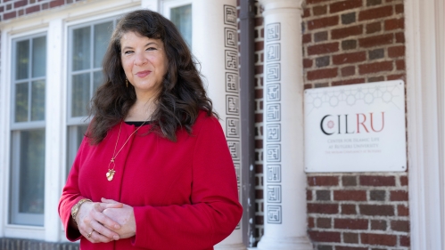 Atiya Aftab in front of the Center for Islamic Life