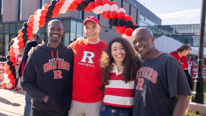 The Arinzehs, left to right, Ukachi, Uzo, Ugo and Uchenna, enjoy the homecoming tailgate at Rutgers–New Brunswick.