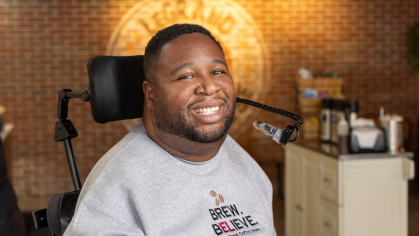 Caption: Rutgers Hall of Distinguished Alumni inductee Eric LeGrand SAS’14 at his coffee shop in Woodbridge, New Jersey. Photo by John O’Boyle.