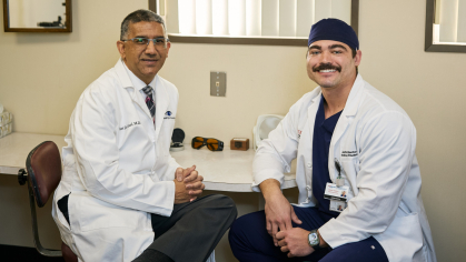 Rutgers alumnus Ravi Goel, left, with Class of 2026 graduating medical student Justin Benton, at Goel's ophthalmology office in Cherry Hill, New Jersey. Photo by Jonathan Kolbe.