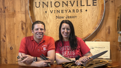Rutgers–New Brunswick alumni John CC’09 and Jennifer Cifelli MGSA’08 in the Unionville Vineyards tasting room in Ringoes, New Jersey. Photo by Allison Freeman.