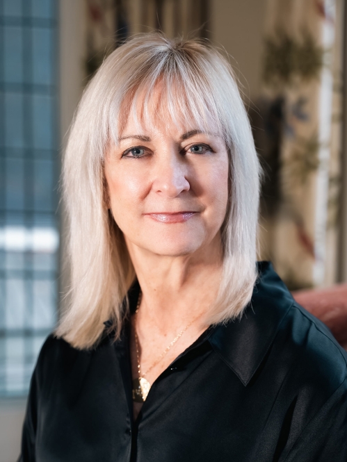Julie A. Domonkos DC’83