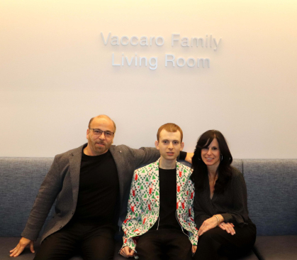 The Vaccaro family (left to right: John, his son Frankie, and his wife Laura) in the living room of the Rutgers Center for Adult Autism Services.