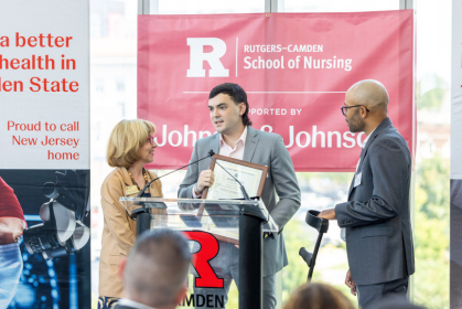 Nick Feldman from the office of United States Congressman Donald Norcross presented Dean Nickitas and Adam Taliaferro with a proclamation commemorating the partnership and the investment in students and workforce development. Photo Credit: John O'Boyle