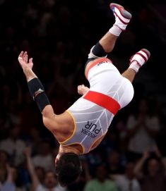 Sebastian Rivera flips in celebration of his bronze Olympic medal