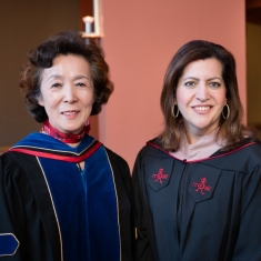 Rutgers Business School Dean Lei Lei, left, with Frias