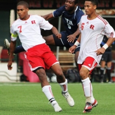 Chung, left, in action for the Scarlet Raiders when he was a student.