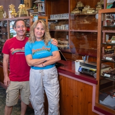 The Schnurs in the chocolate and ice cream shop they have owned since 1988.