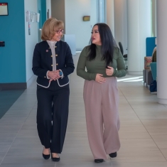 Dean Donna M. Nickitas chats with Neselle Nardo at the Rutgers School of Nursing-Camden.