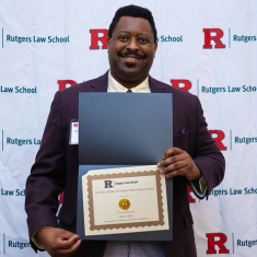 Kerry Robinson won a Rutgers Philbrook Award in 2025 for outstanding public service.