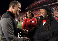 LeGrand and his mother, Karen, speak with Greg Schiano prior to a 2017 game against Ohio State.