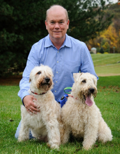 Dougherty in 2016 with dogs Liam and Declan, both soft-coated wheaten terriers. He now has a 12-year-old of the same breed named Ronan.