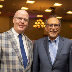 School of Arts and Sciences–Camden Dean John Griffin with Fishman at the spring 2026 scholarship reception.