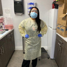 Liang working in scrubs at CityMD in Hoboken during the pandemic
