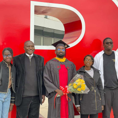 The Diop family enjoy Papa Macissé’s graduation in 2021.