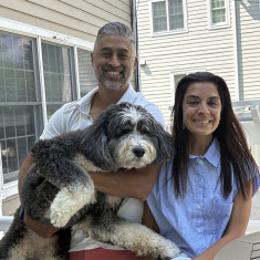 Neil G. Shastri Foundation President Umang Shastri PHARM’96 and wife Shefali M. Shastri RC ’96, RWJMS’02 with their dog Chelsea. Photo By Allison Freeman