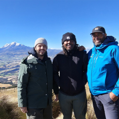Left to right, Rutgers–Newark students Saleh Younes and Elias Porter, with Walton in August, in the Ecuador Sustainable Communities and Eco-Immersion expedition field study program in front of the Cayambe mountain.